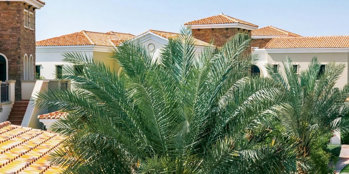 Family enjoying outdoor living area at a villa in a gated community