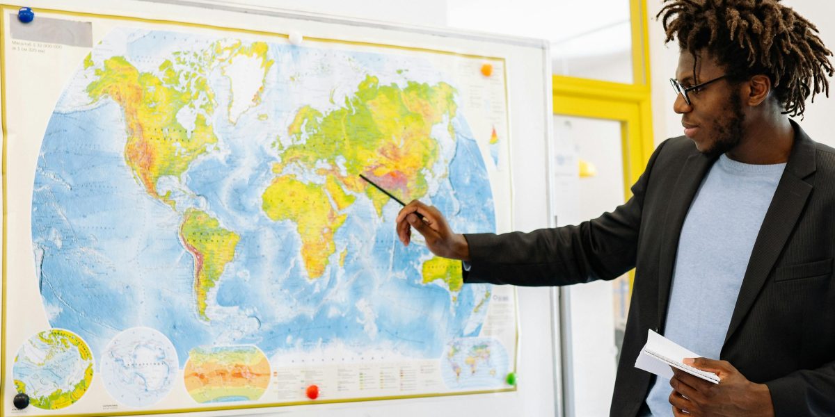 An individual examining a map, highlighting the importance of geographical context in property search.