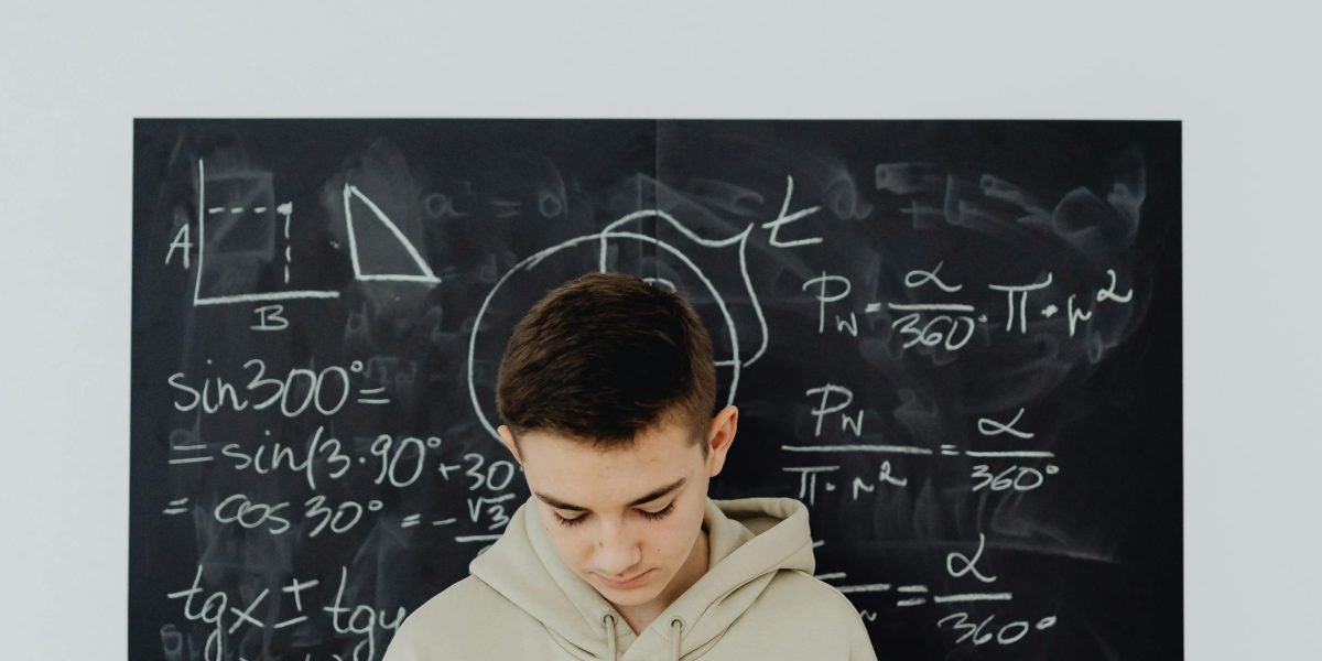 A professional contemplating solutions to complex challenges in a competitive industry.