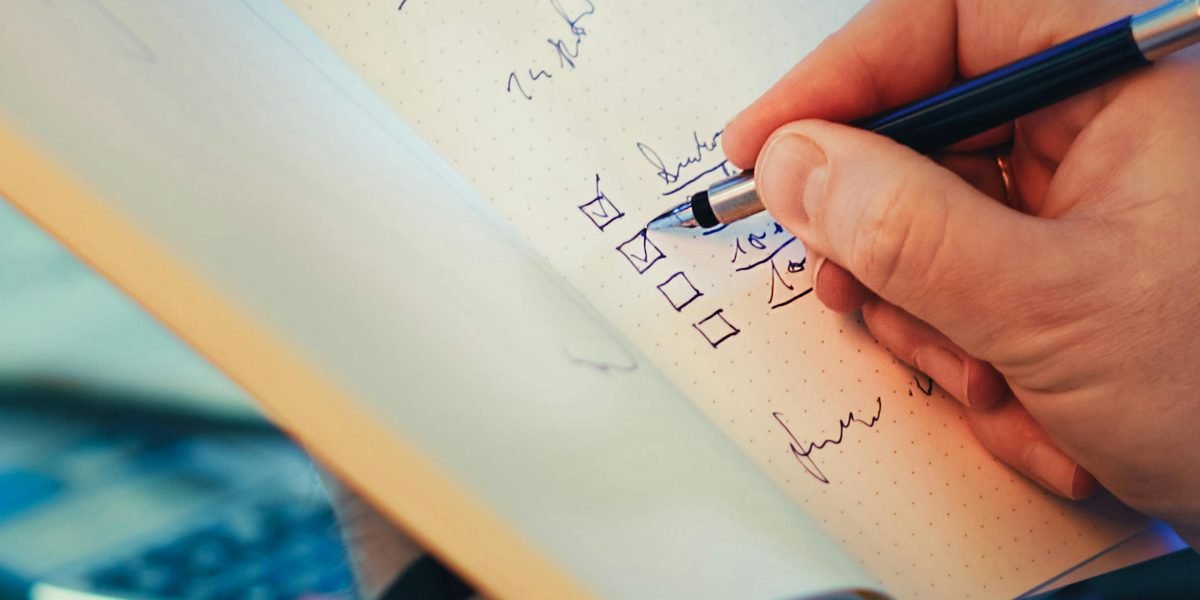 A person carefully reviewing a checklist, ensuring all criteria are met before making a decision.