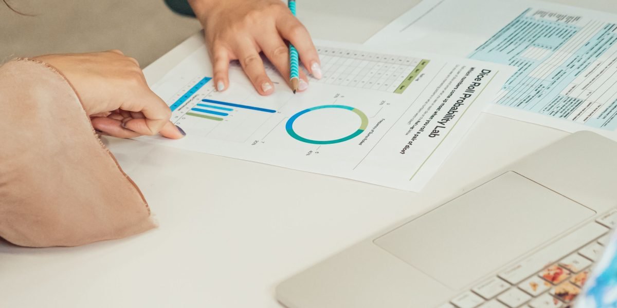 An investor carefully reviews market data and trends to make informed decisions.