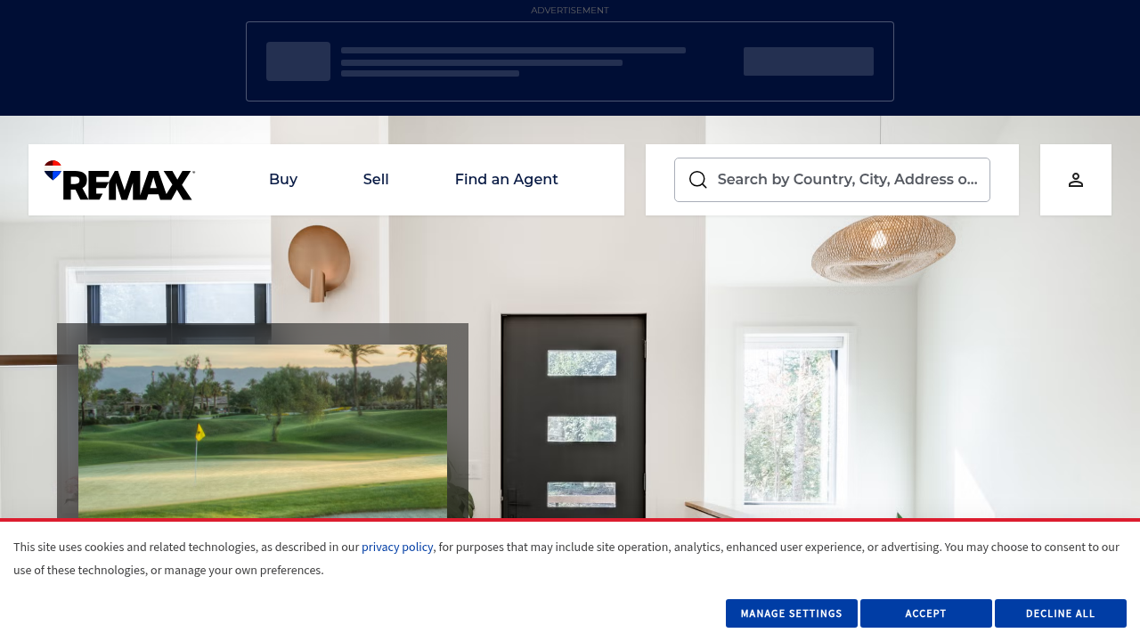 Compare the offerings of a well-known global real estate brand like RE/MAX, often mentioned alongside specialized luxury agencies.