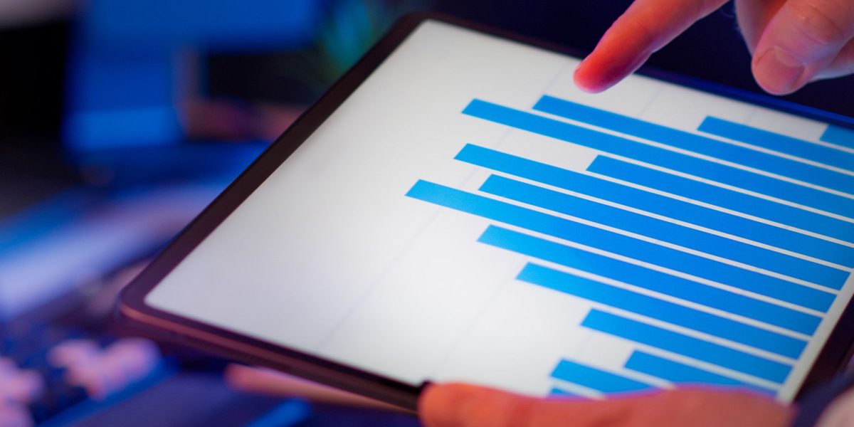 A professional analyzing market trends and data to inform investment decisions.