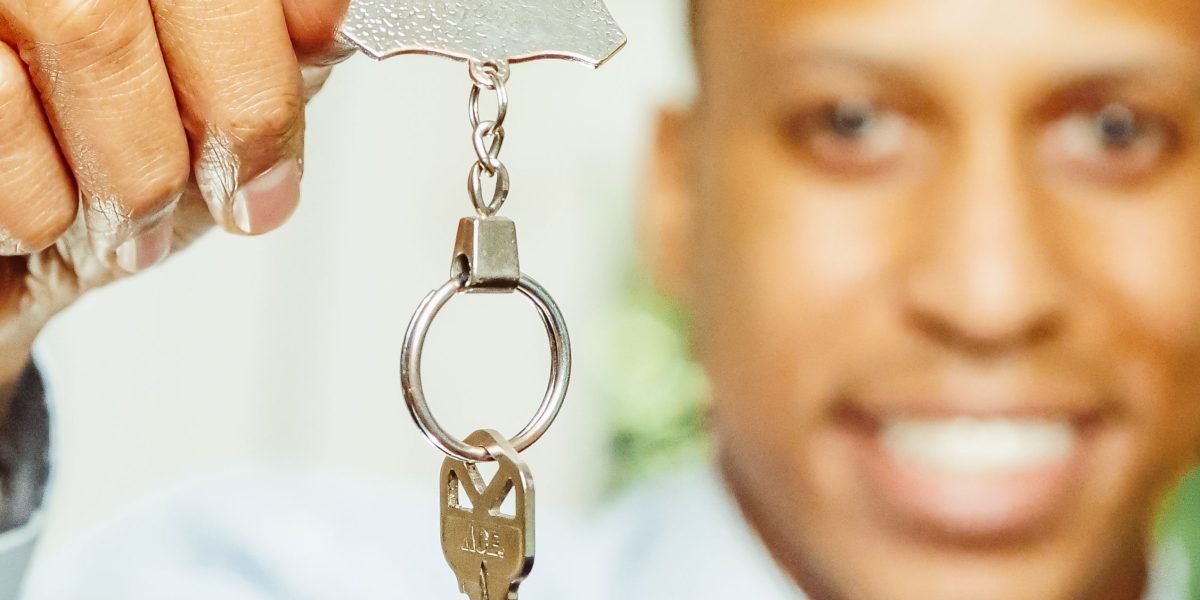 The joyful moment of receiving keys after a successful luxury villa purchase in Dubai.